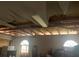 Image shows a garage with ceiling damage, needing significant repairs, and reflects a fixer-upper opportunity at 1 Clubhouse Rd, Rotonda West, FL 33947