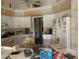 Outdated kitchen with white cabinets and appliances needing updating at 1 Clubhouse Rd, Rotonda West, FL 33947