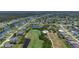 Expansive aerial view of the community featuring golf courses, ponds, and single-Gathering homes at 1002 Rotonda Cir, Rotonda West, FL 33947