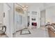Elegant foyer with tile flooring and ample natural light, creating a welcoming entrance to the home at 1002 Rotonda Cir, Rotonda West, FL 33947