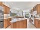 Bright, functional kitchen featuring sleek appliances and ample counter space, ideal for cooking enthusiasts at 1002 Rotonda Cir, Rotonda West, FL 33947