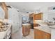 Well-equipped kitchen with modern appliances and an island, perfect for meal preparation and casual dining at 1002 Rotonda Cir, Rotonda West, FL 33947