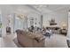 Comfortable living room with high ceilings, perfect for relaxing and entertaining in style at 1002 Rotonda Cir, Rotonda West, FL 33947