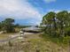 Scenic view of a covered pavilion at Lemon Bay Park with picnic tables and natural surroundings at 1040 Caples St, Englewood, FL 34223