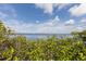 Picturesque bay view framed by lush greenery, providing a serene and natural backdrop at 1040 Caples St, Englewood, FL 34223