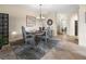 Elegant dining area with stylish decor, perfect for enjoying meals and creating lasting memories at 10521 Amberjack Way # 303, Englewood, FL 34224
