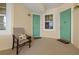 Cozy exterior entrance featuring charming decor and seating, perfect for enjoying the outdoors at 10521 Amberjack Way # 303, Englewood, FL 34224