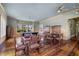 Bright game room with a pool table, multiple windows, and ample seating for entertainment at 10521 Amberjack Way # 303, Englewood, FL 34224