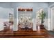 Interior lobby with hardwood floors, view of the seating area and natural light at 10521 Amberjack Way # 303, Englewood, FL 34224