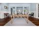Interior of a large lobby featuring hardwood floors and light blue walls at 10521 Amberjack Way # 303, Englewood, FL 34224