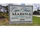 Sign for Cape Haze Marina, promoting a friendly, fun, and festive atmosphere at 10521 Amberjack Way # 303, Englewood, FL 34224