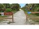 Scenic path for foot traffic only, surrounded by lush greenery, ideal for a peaceful walk at 10521 Amberjack Way # 303, Englewood, FL 34224