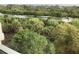 Lush greenery surrounds a peaceful river teeming with wildlife, creating a serene nature view at 10521 Amberjack Way # 303, Englewood, FL 34224
