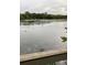 Picturesque water view with various birds, offering a tranquil natural setting at 10521 Amberjack Way # 303, Englewood, FL 34224