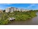 Waterfront condos offer stunning views and a private dock for enjoying the natural surroundings at 10521 Amberjack Way # 303, Englewood, FL 34224