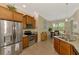 Kitchen area featuring stainless appliances, granite countertops and an eat-in dining area at 13051 Creekside Ln, Port Charlotte, FL 33953