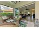 Inviting screened lanai offering seamless indoor-outdoor living, with views of the main living area at 13051 Creekside Ln, Port Charlotte, FL 33953