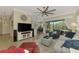 Open-concept living area with tile flooring and neutral walls at 13051 Creekside Ln, Port Charlotte, FL 33953