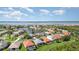 Beautiful aerial view of residential community with scenic water views and perfectly manicured landscaping at 13376 Golf Pointe Dr, Port Charlotte, FL 33953