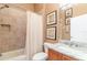 Cozy bathroom featuring granite countertops and a tile-surround shower-tub combination at 13376 Golf Pointe Dr, Port Charlotte, FL 33953
