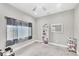 Bedroom features natural light, neutral colors, ceiling fan and open space at 15610 Staunton Cir, Port Charlotte, FL 33981