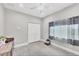 Bedroom with neutral colors, a ceiling fan, and an ample storage closet at 15610 Staunton Cir, Port Charlotte, FL 33981