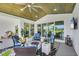 Relaxing outdoor patio area with cozy seating, stylish decor, and ample space for entertaining at 15610 Staunton Cir, Port Charlotte, FL 33981