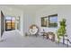 Charming patio area with comfortable seating, stylish decor, and tranquil surroundings at 15610 Staunton Cir, Port Charlotte, FL 33981