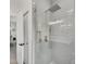 Modern bathroom shower with subway tile and sleek fixtures, and a glass enclosure at 15610 Staunton Cir, Port Charlotte, FL 33981
