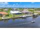 Stunning waterfront property highlighting the canal and boat docks for easy access to water activities at 15610 Staunton Cir, Port Charlotte, FL 33981