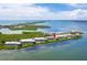 Stunning aerial view of waterfront condo community near the ocean at 1591 Beach Rd # 402, Englewood, FL 34223