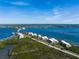 Scenic aerial view showcases the waterfront condo community near the bay at 1591 Beach Rd # 402, Englewood, FL 34223