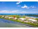Stunning aerial view of waterfront condo community near the ocean at 1591 Beach Rd # 402, Englewood, FL 34223
