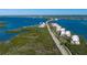 Scenic aerial view showcases the waterfront condo community near the bay at 1591 Beach Rd # 402, Englewood, FL 34223