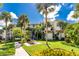 Beautiful three-story condo building has lush landscaping and a picnic area at 1591 Beach Rd # 402, Englewood, FL 34223