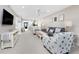 Bright living area connects to kitchen and offers a welcoming, neutral decor at 1591 Beach Rd # 402, Englewood, FL 34223