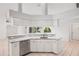 Kitchen featuring granite countertops, stainless steel appliances, and a view of the pool at 18112 Windswept Av, Port Charlotte, FL 33948
