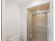 Bathroom featuring a shower with sliding glass doors at 18112 Windswept Av, Port Charlotte, FL 33948