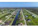 High angle aerial view of canal-front properties in a neighborhood at 204 W Pine Valley Ln, Rotonda West, FL 33947