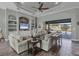 Spacious living room with coffered ceilings, tiled floors, and an outdoor view at 204 W Pine Valley Ln, Rotonda West, FL 33947