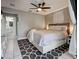 Bedroom with neutral decor and access to bathroom at 21519 Fairway Ave, Port Charlotte, FL 33952