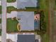 Aerial view showing the property's backyard pool, patio, and lush landscaping at 22 Par View Rd, Rotonda West, FL 33947
