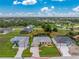 Aerial view of a single-Gathering home nestled in a lush community at 22 Par View Rd, Rotonda West, FL 33947