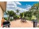 The backyard boasts a brick patio, tropical foliage and a screened-in lanai at 22 Par View Rd, Rotonda West, FL 33947