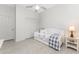 Cozy bedroom featuring neutral walls, tile floor, and a daybed with a pull-out trundle at 22 Par View Rd, Rotonda West, FL 33947