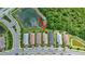 A neighborhood with well-maintained homes surrounded by greenery and a scenic pond for views at 2592 Brassica Dr, North Port, FL 34289