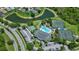 Aerial view of the community clubhouse with a resort-style pool, tennis courts, and a playground at 2592 Brassica Dr, North Port, FL 34289