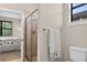 Bathroom showcasing a glass-enclosed shower and serene atmosphere at 2592 Brassica Dr, North Port, FL 34289