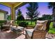 Screened-in patio offers a relaxing view of the evening sky and tranquil outdoor scenery at 2592 Brassica Dr, North Port, FL 34289