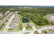 Charming homes surround a serene pond in this peaceful community with lush landscaping at 267 Talquin Ct, Englewood, FL 34223